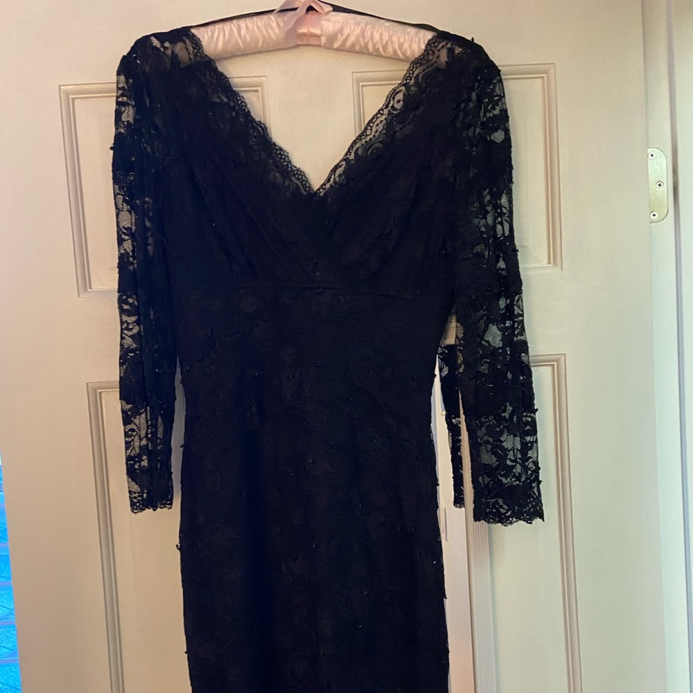 Cocktail dress. Size 2. Does not have tags but it has never been worn